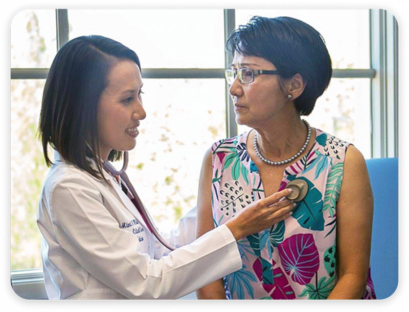 Dr. Xuanha White with a pulmonary patient Integra Health PC